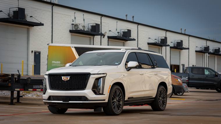 White Cadillac Escalade Sport paint protection film — front three quarter at Humble Crew Auto Spa, Plano TX