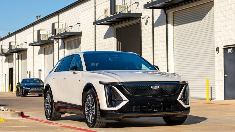 White Cadillac Lyriq Sport ceramic coating — front three quarter at Humble Crew Auto Spa, Plano TX
