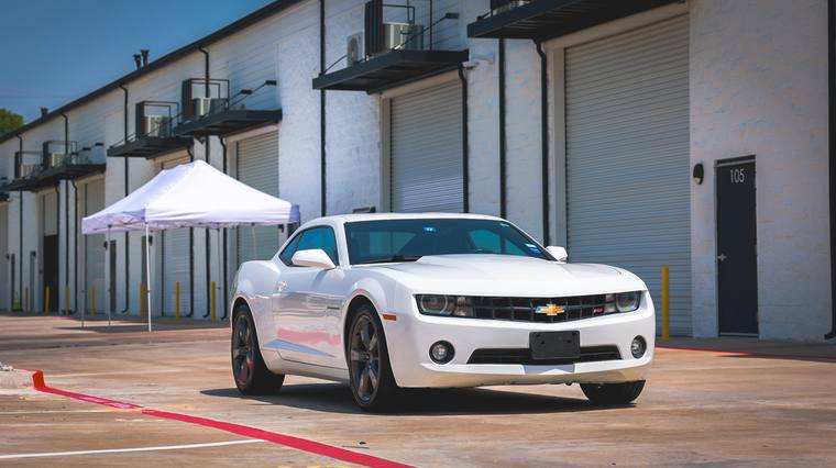 White Chevrolet Camaro RS ceramic coating — front three quarter at Humble Crew Auto Spa, Plano TX