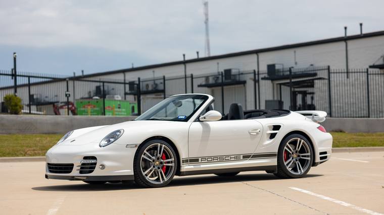 White Porsche 911 997 Turbo Cabriolet interior detailing, exterior detailing — detail front three quarter side decal at Humble Crew Auto Spa, Plano TX