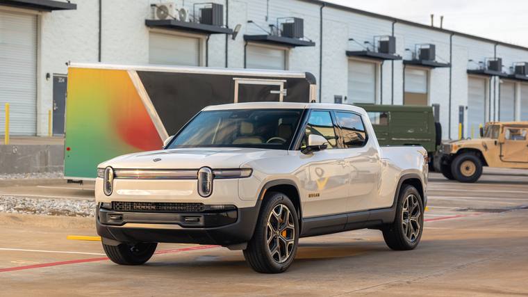 White Rivian R1T paint protection film — front three quarter at Humble Crew Auto Spa, Plano TX