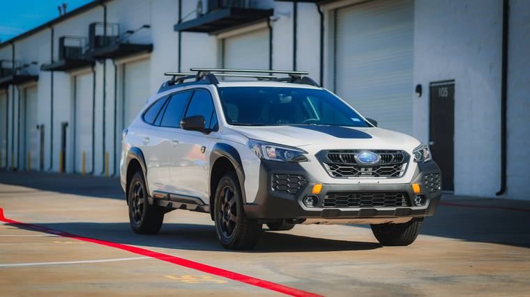White Subaru Outback Wilderness paint protection film, ceramic coating — front three quarter at Humble Crew Auto Spa, Plano TX
