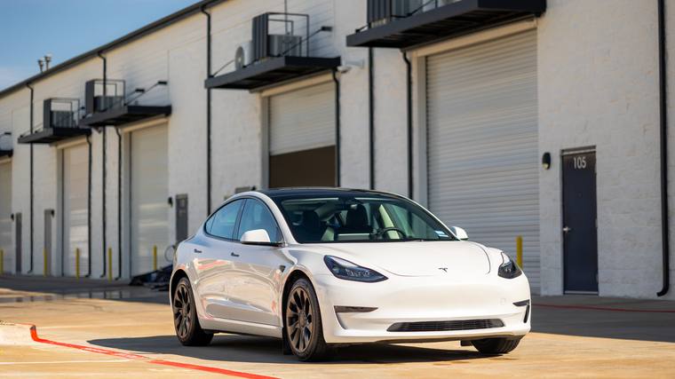 White Tesla Model 3 paint protection film, ceramic coating — front three quarter at Humble Crew Auto Spa, Plano TX