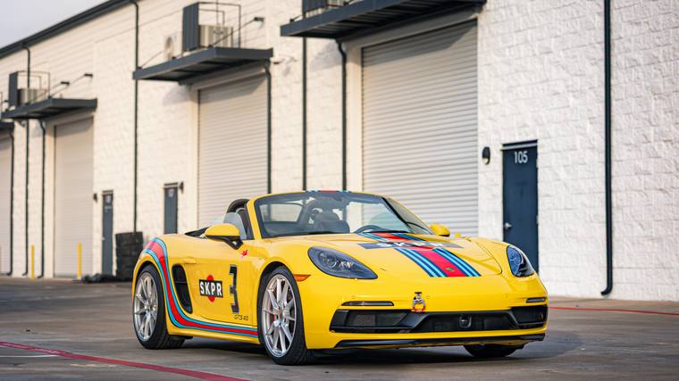 Yellow Porsche 718 Boxster GTS 4.0 — front three quarter at Humble Crew Auto Spa, Plano TX